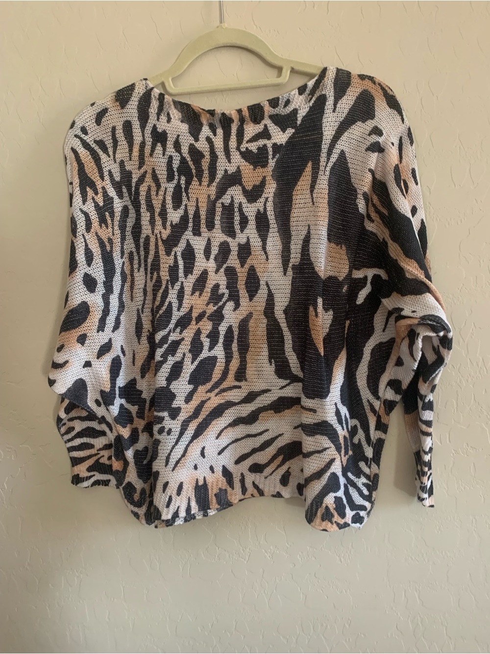 We The Free Animal-Print Crewneck Sweater in Black, White & Tan